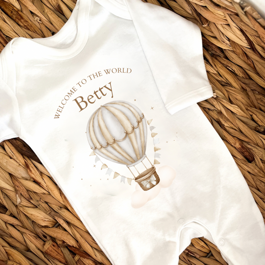 Personalised New Baby Sleepsuit. Welcome to the World Hot Air Balloon Neutral
